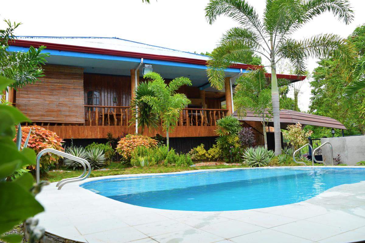 Deluxe villa exterior with pool view