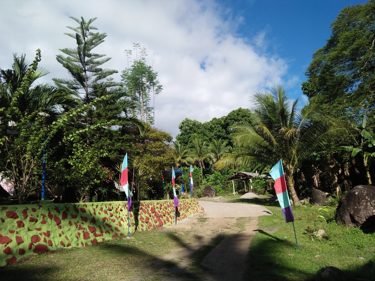 Garden path leading into Villa Corrales